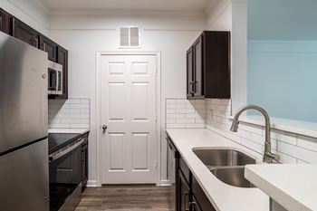 Well equipped kitchen with modern appliances at Grand Villas at Cinco Ranch, Texas, 77494